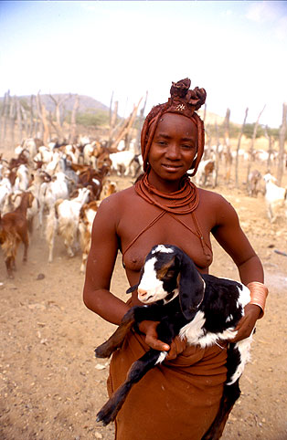 Himba woman catching kids