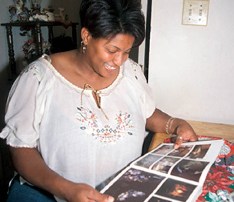 Gwen with the book in 2003  As a lab technician she mails me about the family 