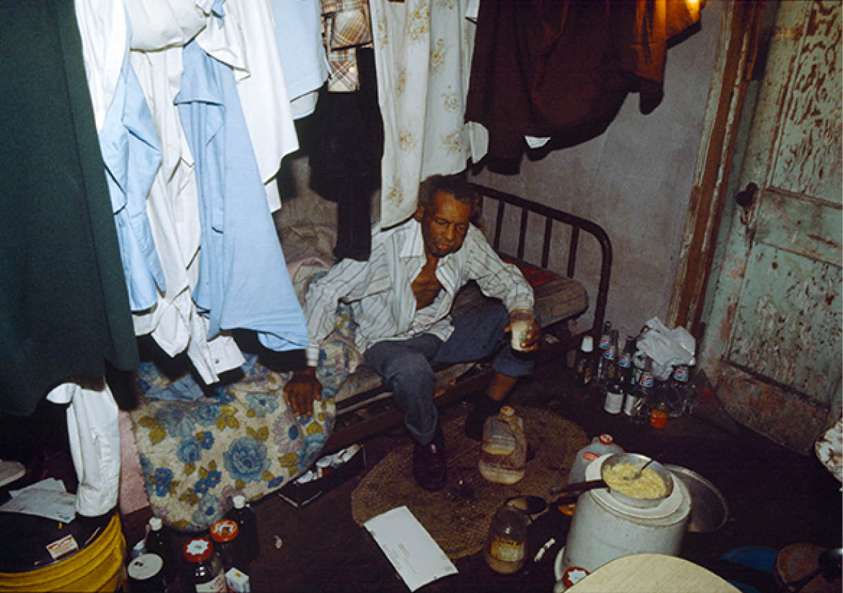 Starving man in Pahokee, FL in 1990 less than an hour away from the millionaires on the right in Palm Beach