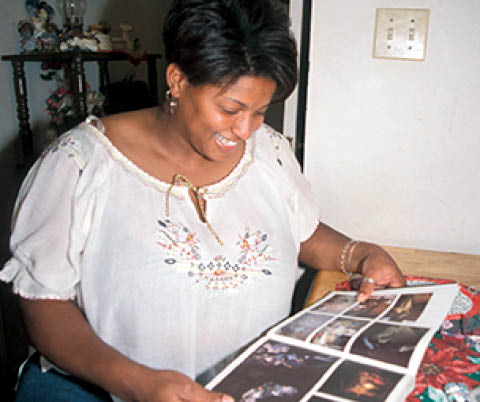 Gwen with the book in 2003  As a lab technician she mails me about the family 