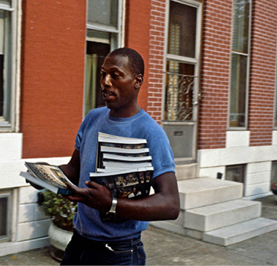 Alfonso carry my books on Baltimore St
