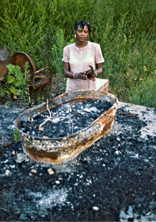 Mary at her house after the firebombing   