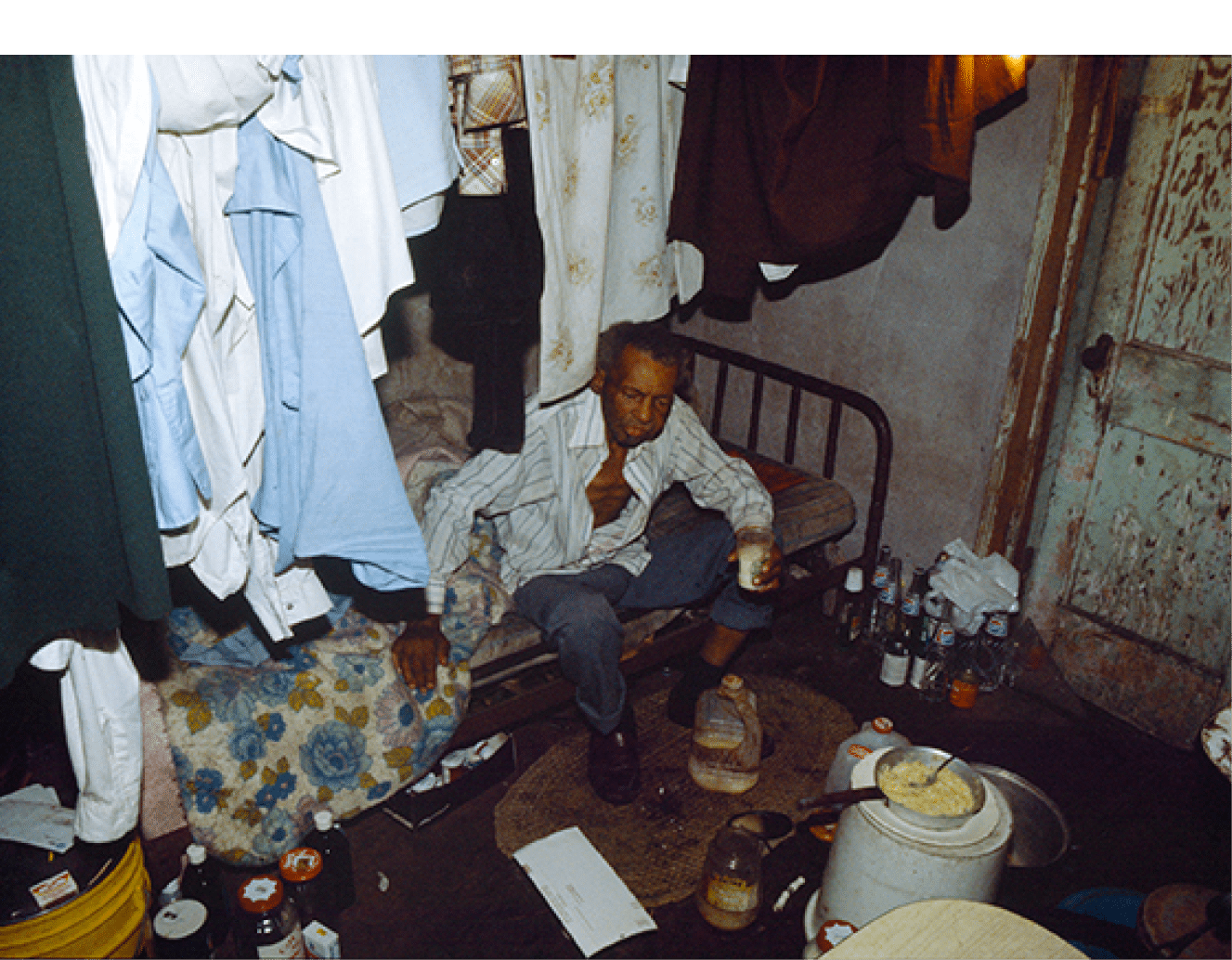 Starving man in Pahokee, FL in 1990 less than an hour away from the millionaires on the right in Palm Beach