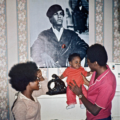 Henry and Ilane at poster of Huey P  Newton 