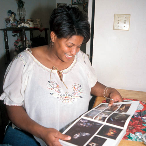 Gwen with the book in 2003  As a lab technician she mails me about the family 