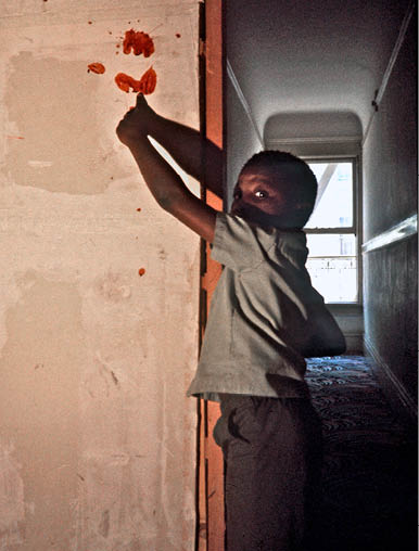 Boy showing where his family member was killed - 1975 SF