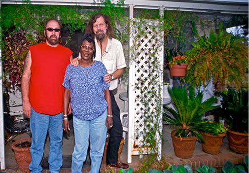 Showing Klan leader Jeff Berry her new garden in the projects 2005   