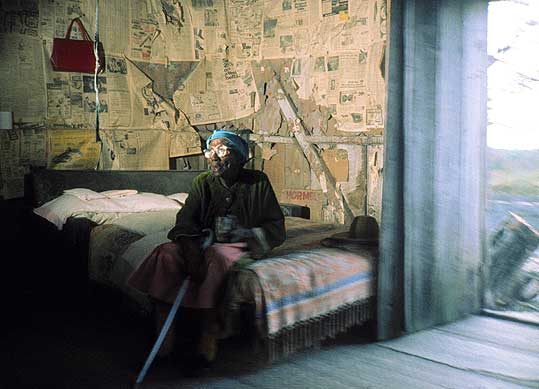 Old woman in shack