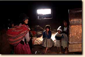 Aymara woman with sick children